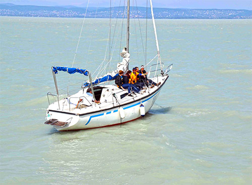 Book sailing boat with a professional skipper. Rent a boat on Balaton lake. Sailing on a Balaton lake